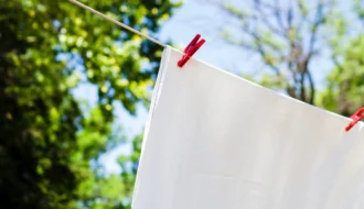 close-up-white-sheet-drying-line