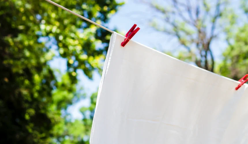 close-up-white-sheet-drying-line